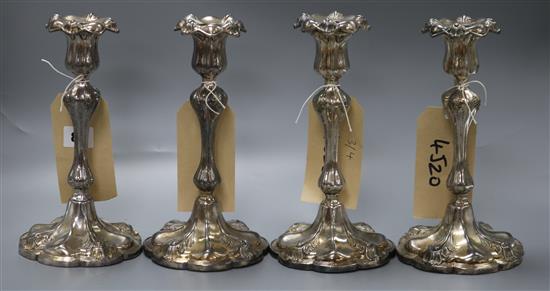 A set of four electroplated candlesticks c.1840 24cm high